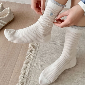 Sweet ballet style ribbed white crew socks with blue heart embroidery and pearl details
