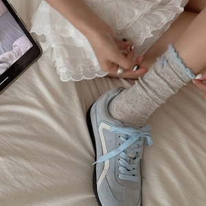 Japanese style lace socks with blue bow and hollow mesh design for sweet college look