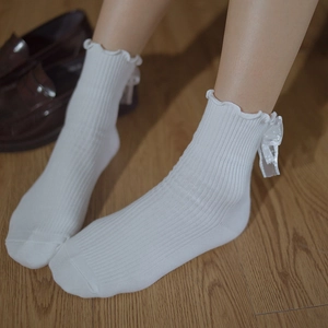 White Lolita JK uniform crew socks with ruffle edges and large satin bows details