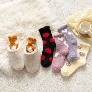 Winter coral fleece home socks and plush slippers set featuring warm heart patterns
