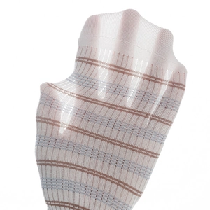 Close-up of hand stretching a purple striped sheer sock to show elasticity and breathability