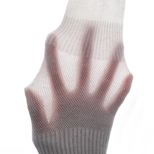 Detail view of white breathable mesh knit fabric with high elasticity on toe socks