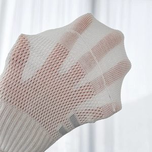Close-up of white breathable mesh fabric showing elastic texture and knit detail