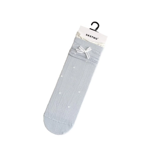 Sweet light blue socks with white lace trim, delicate bow, and fine polka dot texture