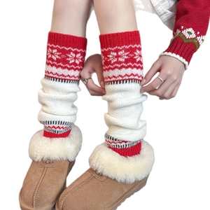 Winter knit leg warmers with red and white snowflake pattern for boots and styling