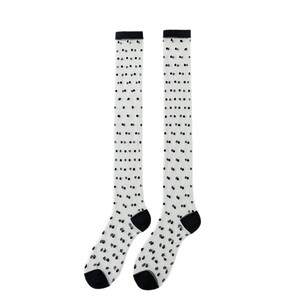 French style sheer white polka dot mid-calf socks with black reinforced heel and toe