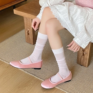 Pink satin Mary Jane flat shoes with strap and white mid-calf socks for women