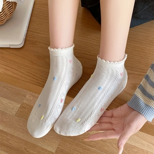 Sweet white ankle socks with colorful hearts and ruffled edges for women