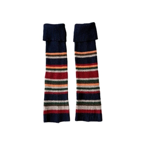 Navy blue ribbed knit leg warmers with multi-color retro stripes for winter warmth