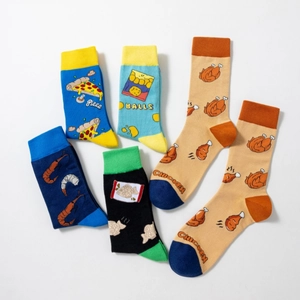 Detail of colorful cotton socks with pizza and fried chicken food patterns