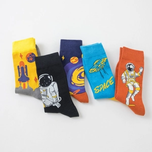 Detailed flat lay of 5 pairs of cotton crew socks featuring astronaut and space patterns