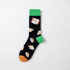 Detail of cotton crew socks featuring Japanese snack patterns with green and orange accents
