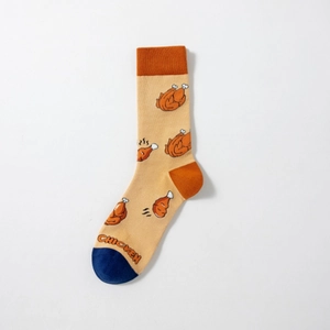 Detail of cotton crew sock with cartoon chicken patterns and woven CHICKEN text