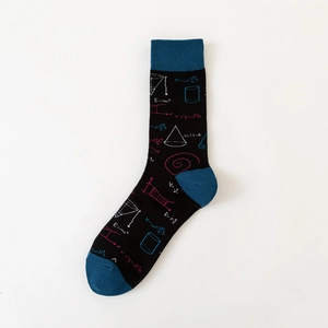 Detail of crew socks with mathematical formulas and physics equations on black fabric