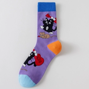 Detail of knit cotton socks featuring a cartoon cat playing guitar with purple body