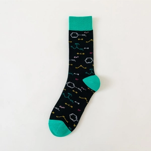 Detail of cotton socks with chemical formulas, molecular patterns, and green accents