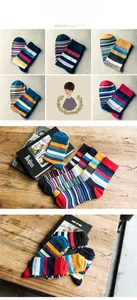 Detailed view of assorted colorful striped crew socks displayed on a rustic wood surface
