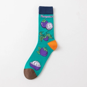 Detail of creative mangosteen fruit print on green cotton crew socks for men