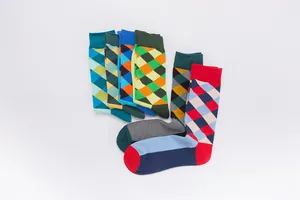 Detailed close-up of colorful Argyle pattern on knitted cotton crew socks for men