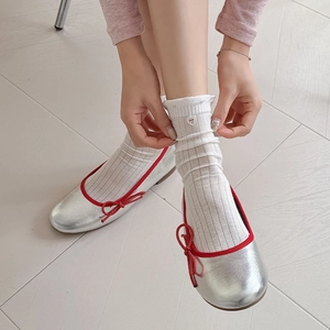 Sweet lace socks for women paired with silver ballet flats and red heart embroidery