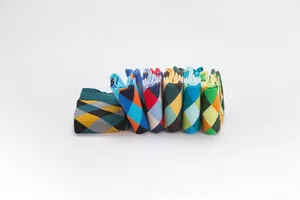Detail of colorful argyle pattern cotton blend crew socks with premium knitted texture