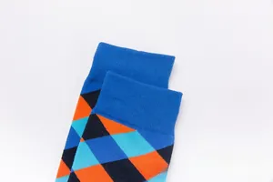 Detailed close-up of ribbed cuffs and colorful diamond pattern on men's crew socks