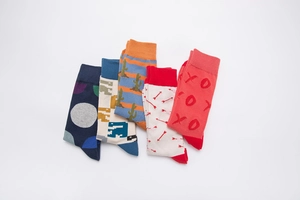 Detailed view of 5 pairs of breathable cotton crew socks with colorful jacquard patterns