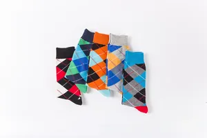Detailed view of 5 pairs of cotton knit crew socks featuring classic colorful argyle patterns