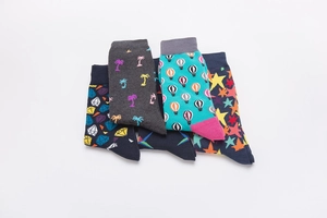 Detailed view of assorted crew socks featuring palm, balloon, star, and diamond patterns