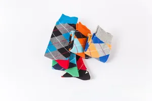 Detailed knit texture of colorful argyle pattern mid-calf cotton socks in classic style