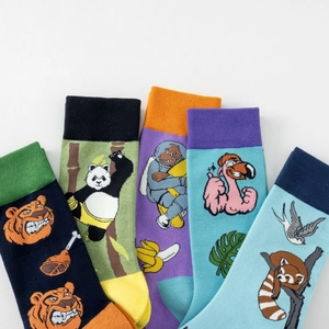 Five pairs of cotton mid-calf socks with creative animal illustrations in a fan layout
