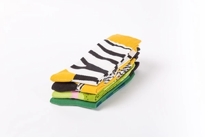 Set of four cotton mid-calf socks with zebra print, kiwi pattern, and colorful designs