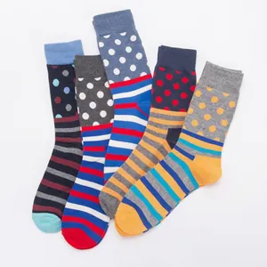 Five pack of crew socks with polka dots and stripes in assorted colors for men and women