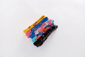 Detail showing colorful knitted crew socks with various abstract patterns on white background