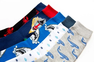 Detailed set of five mid-calf cotton socks with colorful animal pattern illustrations