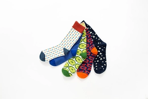 Detailed set of five colorful patterned cotton blend crew socks with vibrant prints