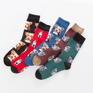 Five pairs of dog breed patterned crew socks in black, red, blue, and green colors