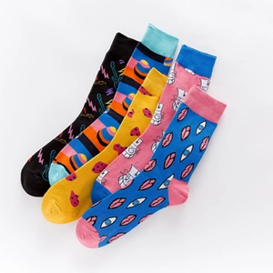 Five pairs of trendy cotton crew socks featuring colorful pop art patterns and graffiti