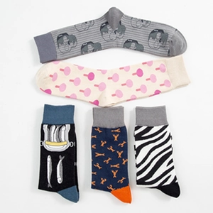 Set of five colorful novelty cotton crew socks featuring skull and animal knit patterns