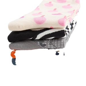 Three-pack cotton socks featuring colorful fruit, zebra stripes and geometric knit patterns