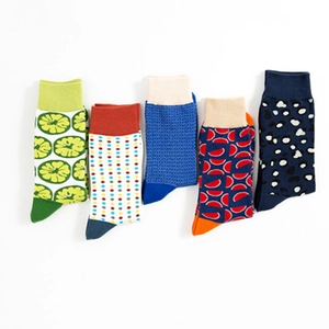 Five-pack of colorful patterned mid-calf socks with lime, dots, and geometric prints