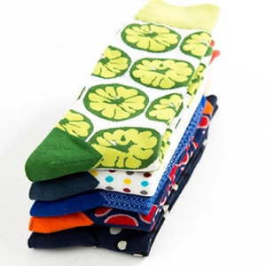 Colorful patterned cotton crew socks featuring lime slices and dots in vibrant shades