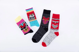 Detailed spread of mid-calf socks featuring unique cat, butterfly and face patterns