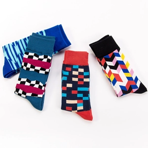 Set of four cotton crew socks with colorful geometric lightning and plaid patterns