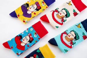 Detailed close-up of Frida Kahlo art socks with vibrant patterns and contrasting colors