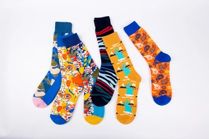 Set of six assorted cotton crew socks featuring colorful abstract retro pop patterns