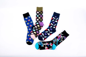 Detailed set of four mid-calf cotton socks with polka dots and colorful magpie patterns