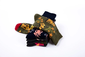 Detailed knit texture of assorted floral and animal patterned mid-calf cotton socks