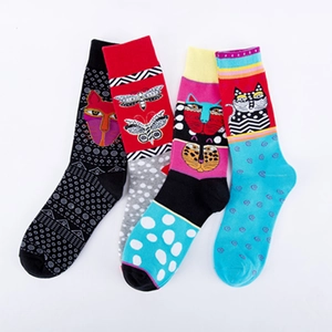 Set of four cotton mid-calf socks with cat and moth patterns in black, red and blue