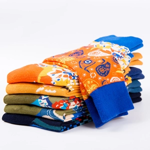 Colorful paisley and abstract pattern cotton crew socks stacked for a stylish casual look